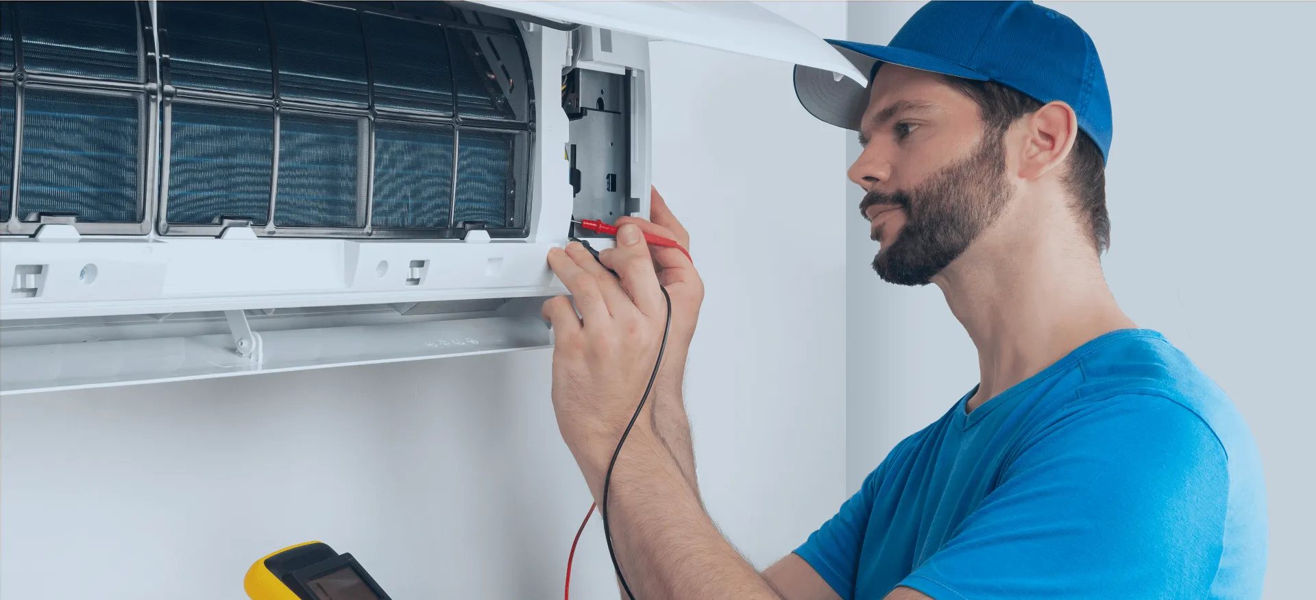 Professional air conditioning repair during daytime service call