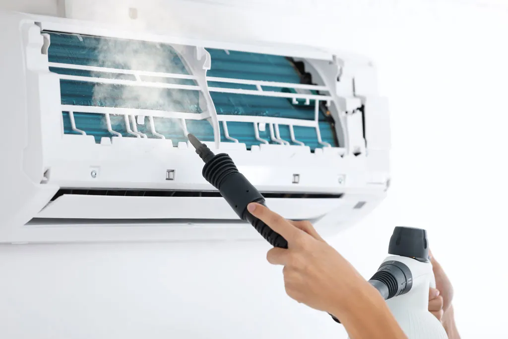 Broken air conditioner compressor requiring emergency repair