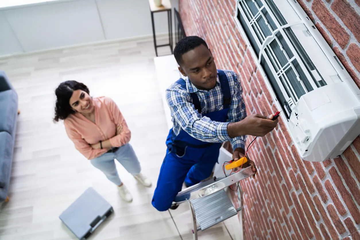 Broken air conditioner compressor replacement by expert technician