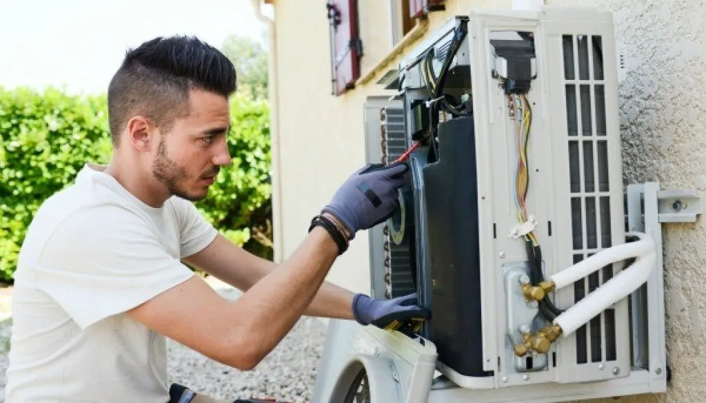 Professional air conditioning repair maintaining system reliability